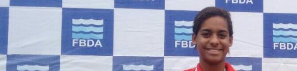 NADADORA EDUARDA JORGE CONDUZ TOCHA OLIMPICA EM PAULO AFONSO/BA   C